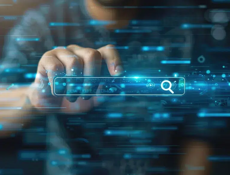 Artificial intelligence search engine interface showing a glowing digital search bar on a touchscreen — B2B visibility in AI-powered search platforms